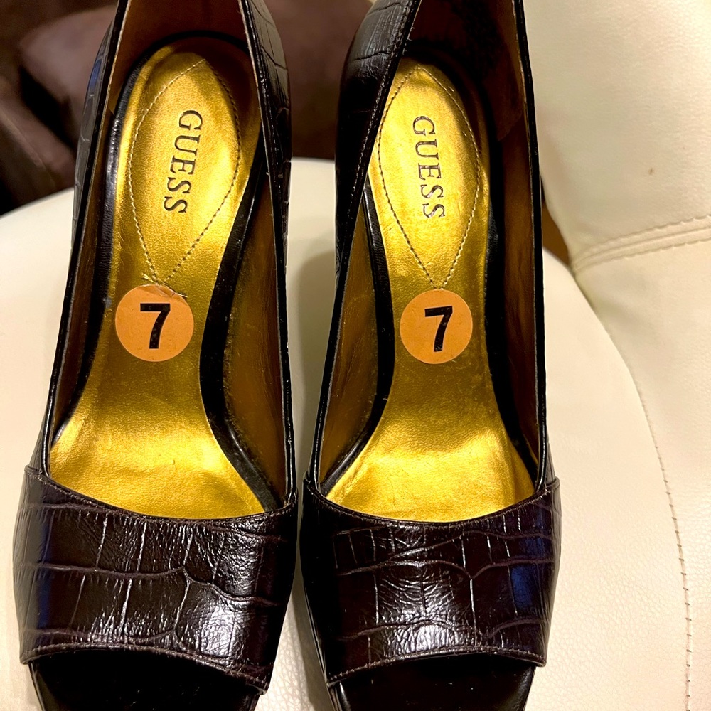 peep toe brown leather high heels. Some shoes may have light sampling wear.